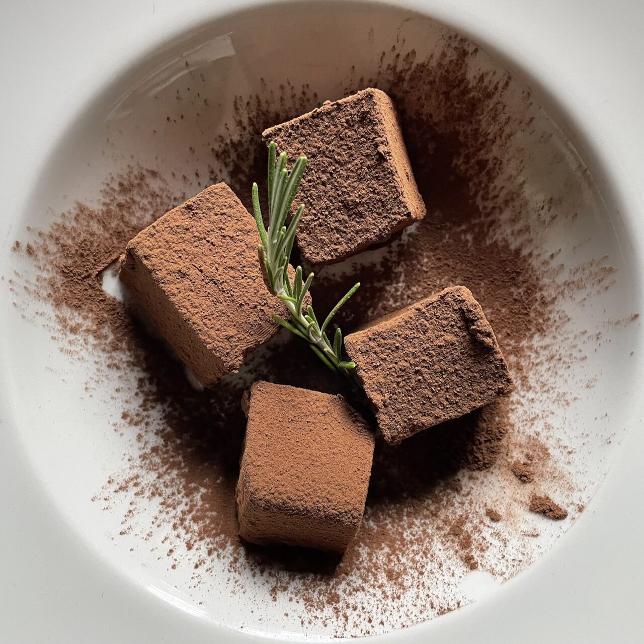 Cocoa truffles with rosemary